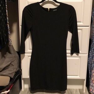 My two mini bebe black dresses